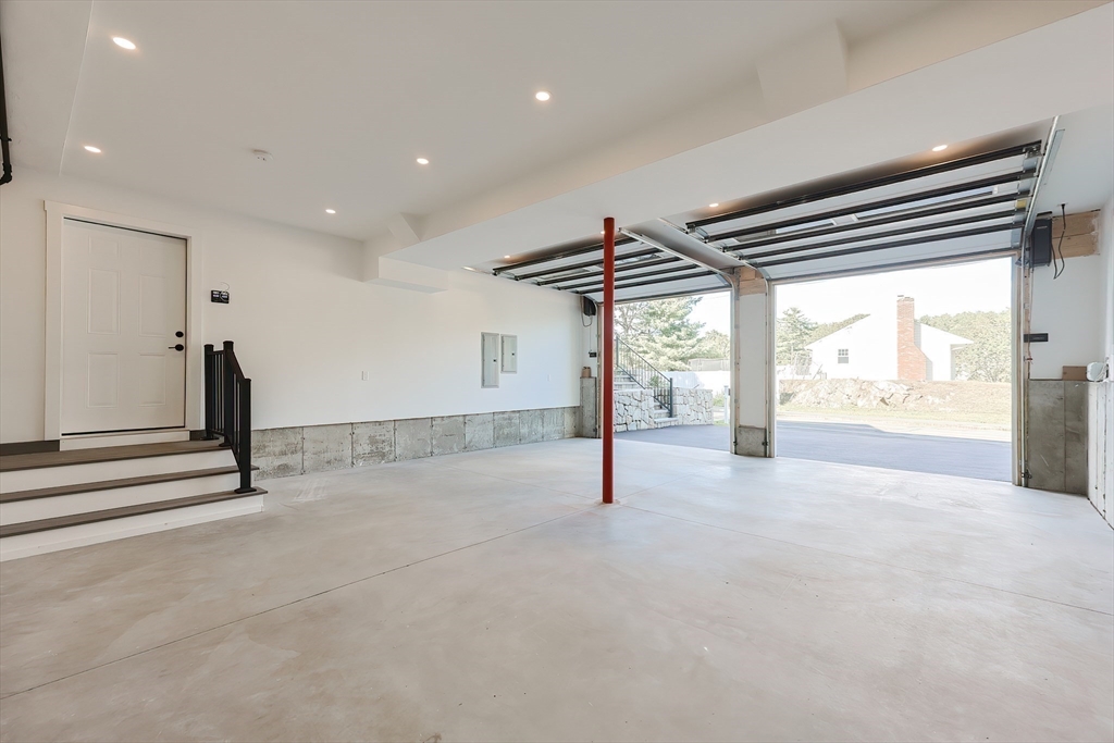 71 Old Nahant Road Wakefield, MA 01880 - Photo 38 of 42 a view of an empty room with a sliding door