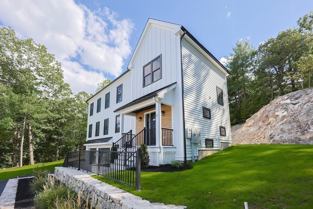 71 Old Nahant Road Wakefield, MA 01880 - Photo 5 of 42 a view of a house with a yard and plants