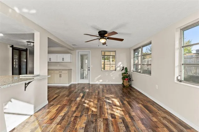 a view of an empty room and window