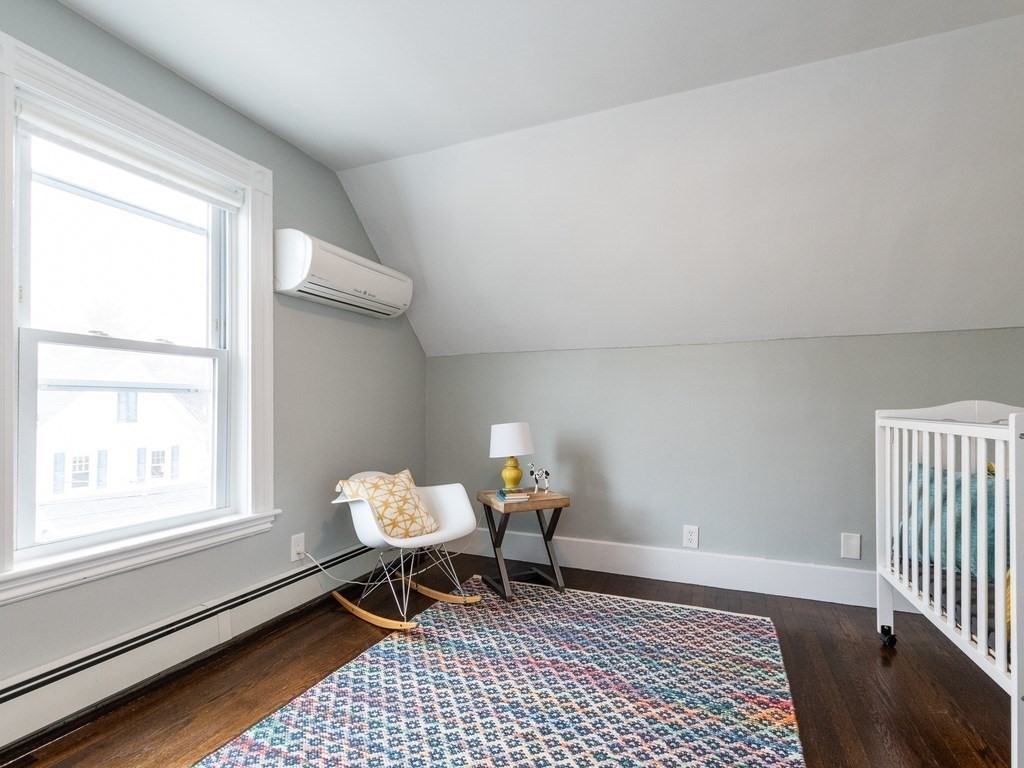 31 Gorham Street, Unit B Somerville, MA 02144 - Photo 26 of 36 a living room with a window