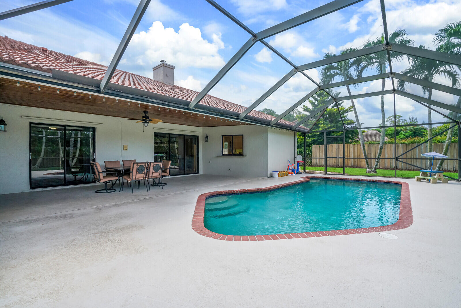 21929 Cricklewood Boca Raton, FL 33428 - Photo 42 of 47 Screened pool and patio