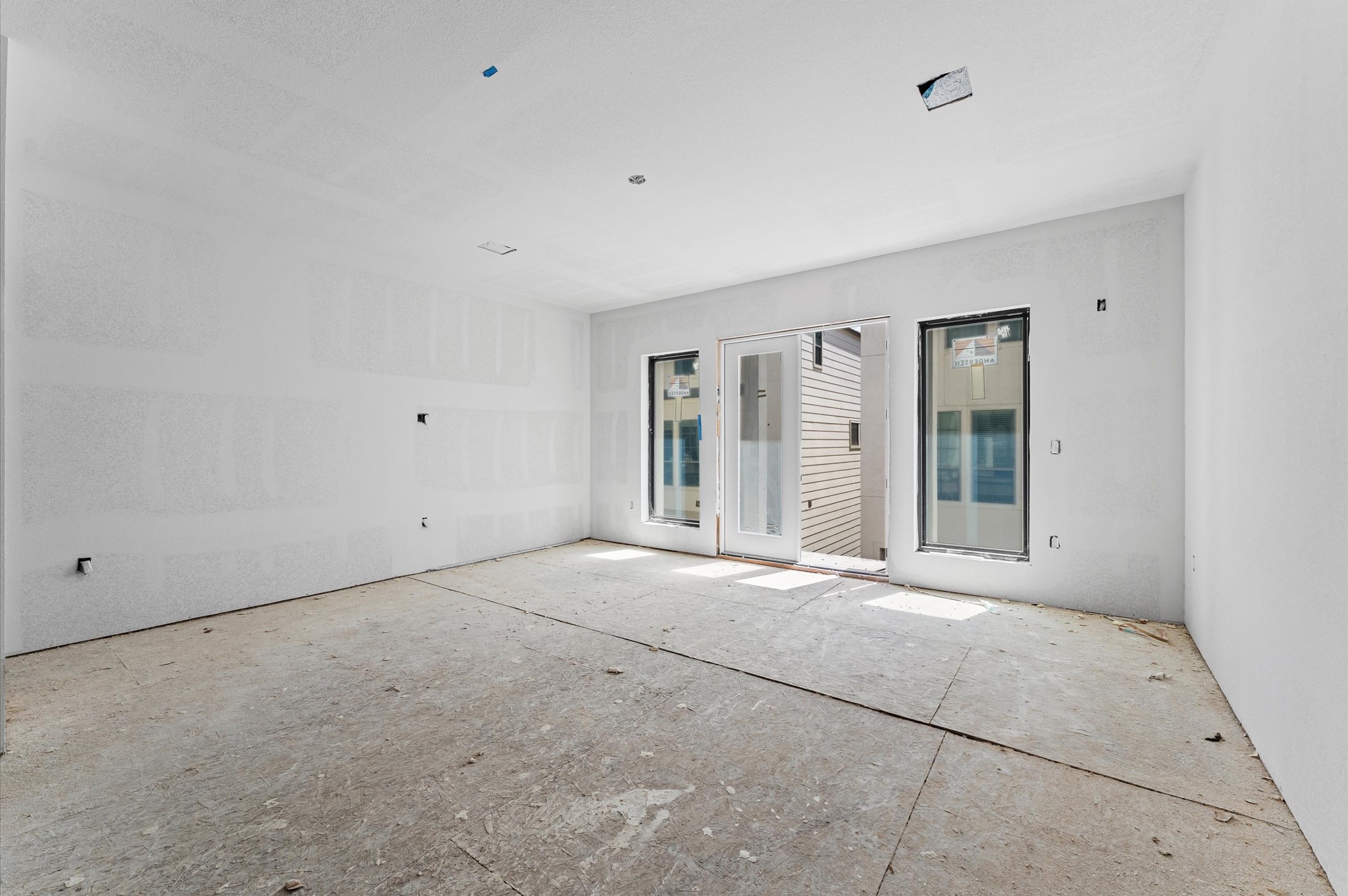 918 Patterson Street Houston, TX 77007 - Photo 11 of 27 a view of an empty room with a window