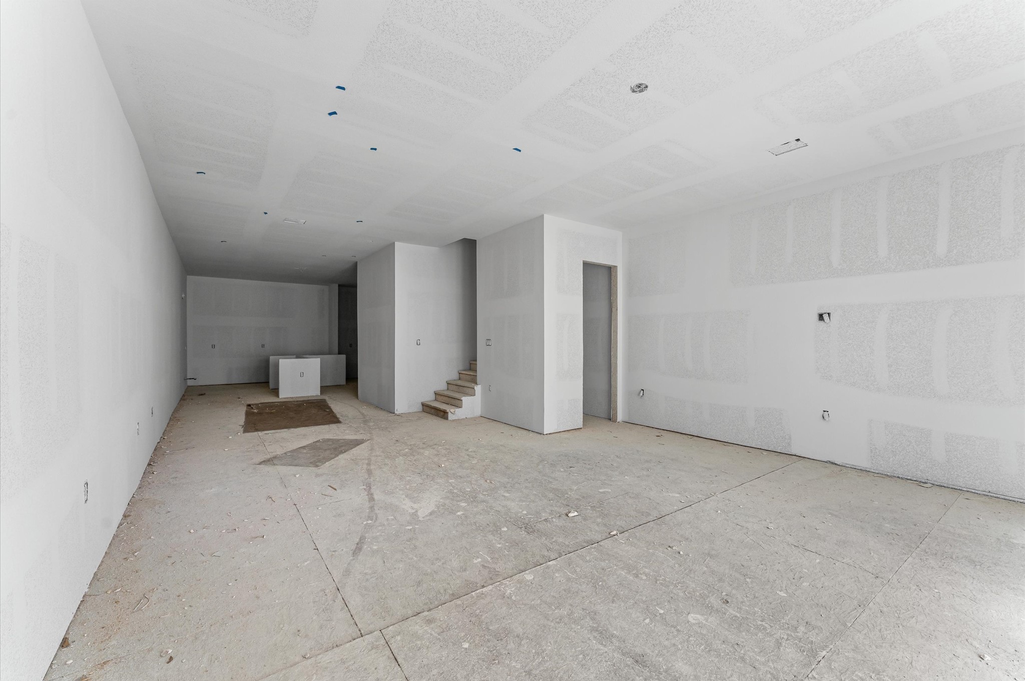 918 Patterson Street Houston, TX 77007 - Photo 12 of 27 a view of a livingroom with a staircase