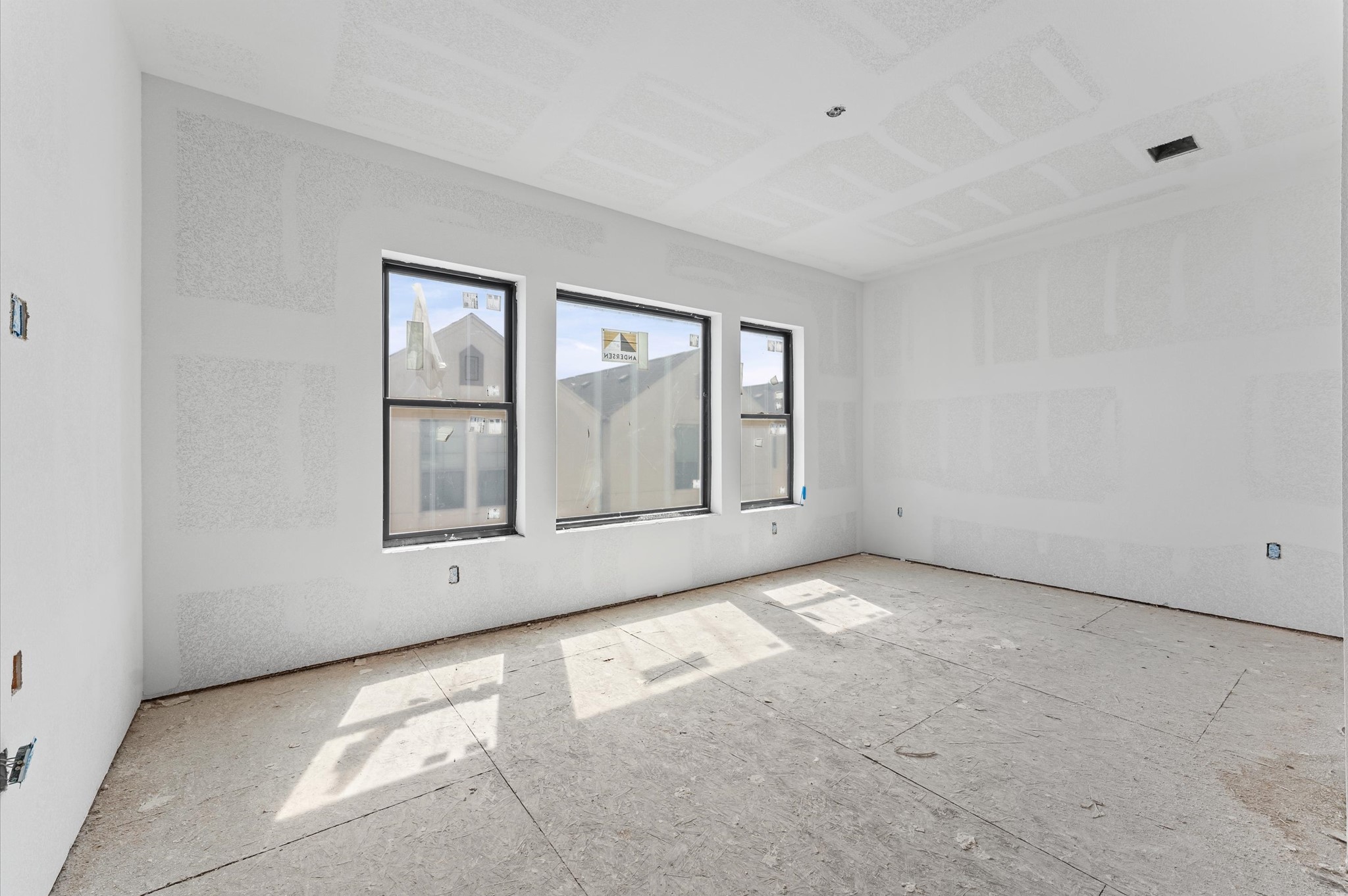 918 Patterson Street Houston, TX 77007 - Photo 24 of 27 a view of an empty room with a window