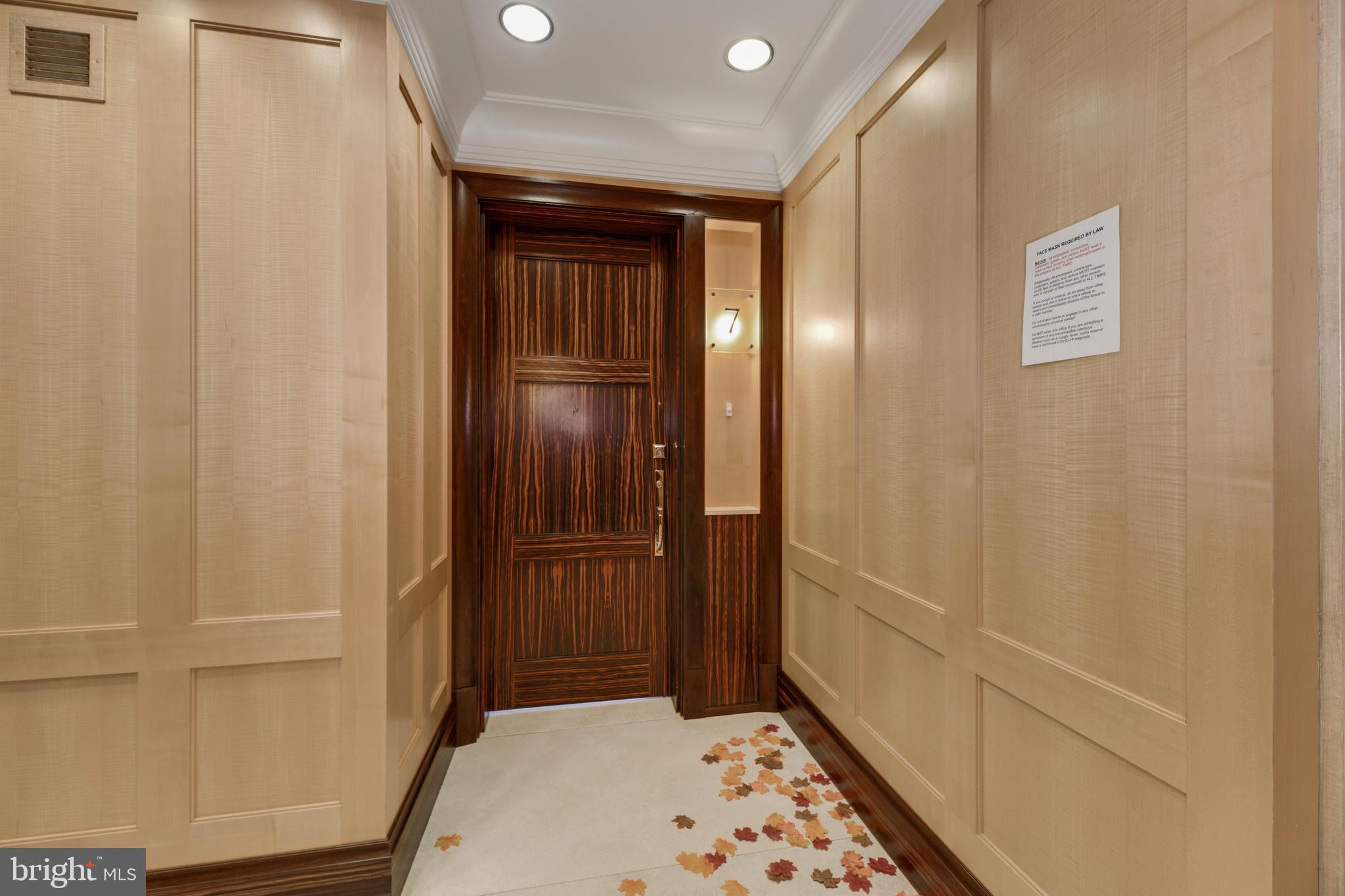 3329 Prospect Street Northwest, Unit 7 Washington, DC 20007 - Photo 4 of 50 a view of hallway with wooden floor