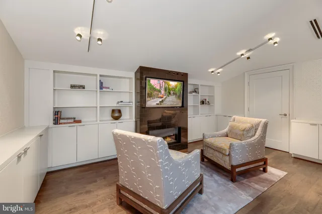 a living room with furniture and window