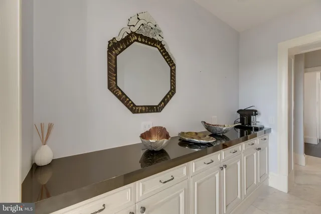 a close view of light fixtures and a sink