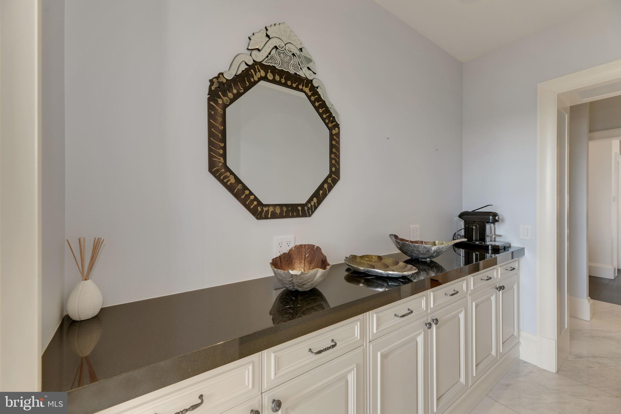 3329 Prospect Street Northwest, Unit 7 Washington, DC 20007 - Photo 10 of 50 a close view of light fixtures and a sink