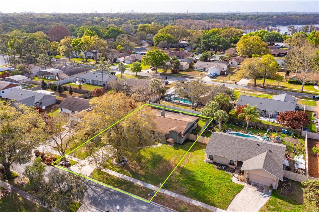 9237 Sabal Palm Circle Windermere, FL 34786 - Photo 2 of 44 an aerial view of residential houses with yard