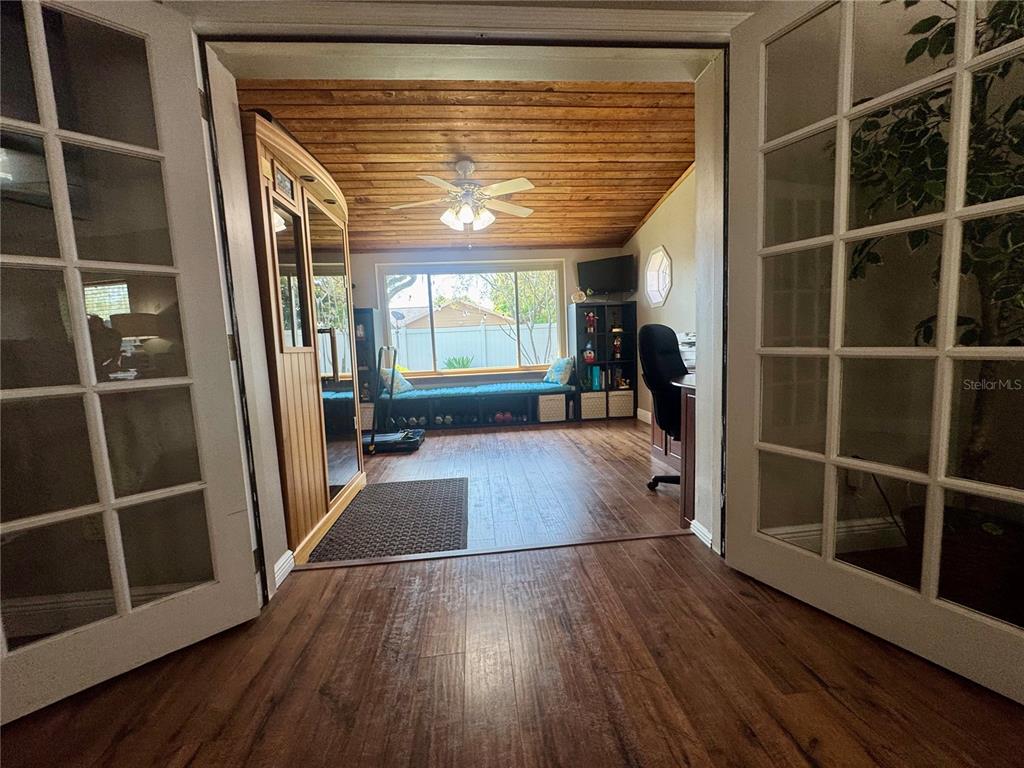 9237 Sabal Palm Circle Windermere, FL 34786 - Photo 24 of 44 a view of livingroom with hardwood floor and a window
