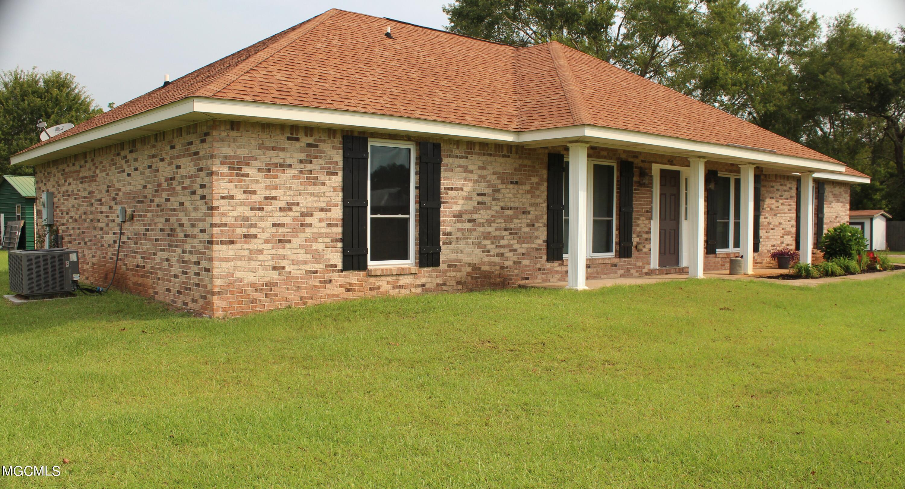 18493 Saucier Lizana Road Saucier, MS 39574 - Photo 2 of 23 Left side