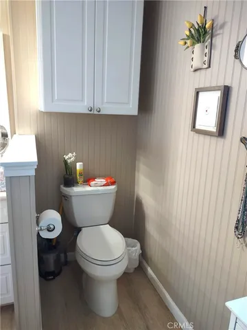 a bathroom with a toilet and a sink