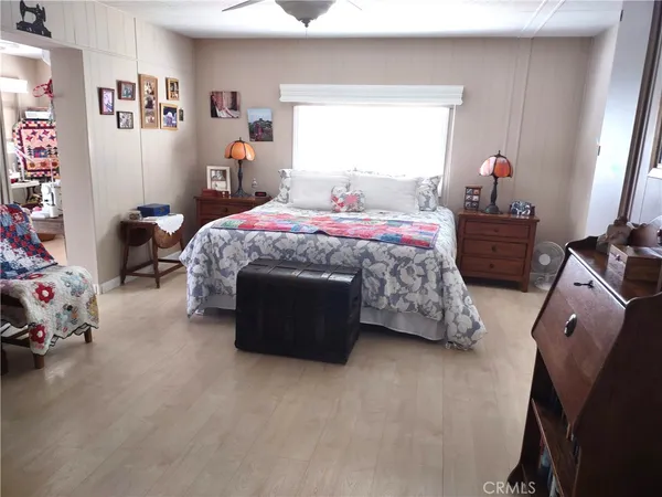 a bed room with a bed and a couch
