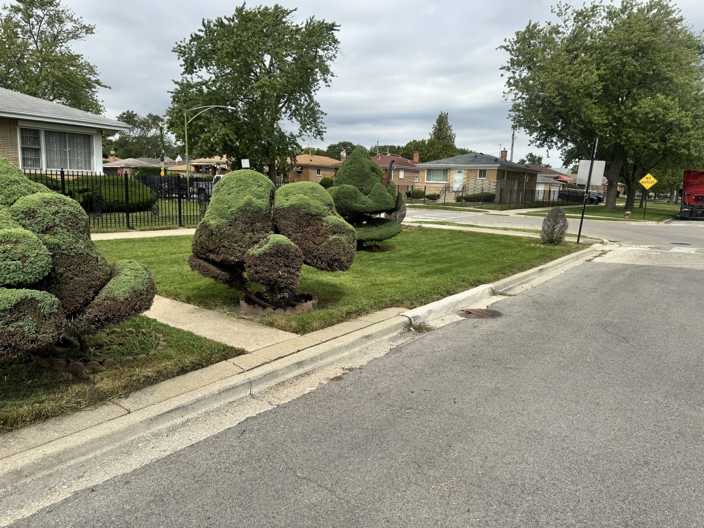 8900 South Prairie Avenue Chicago, IL 60619 - Photo 15 of 18 a view of a street with a building and trees in the background