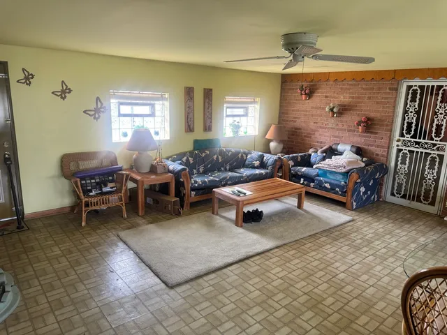 a bed room with a bed and a mirror