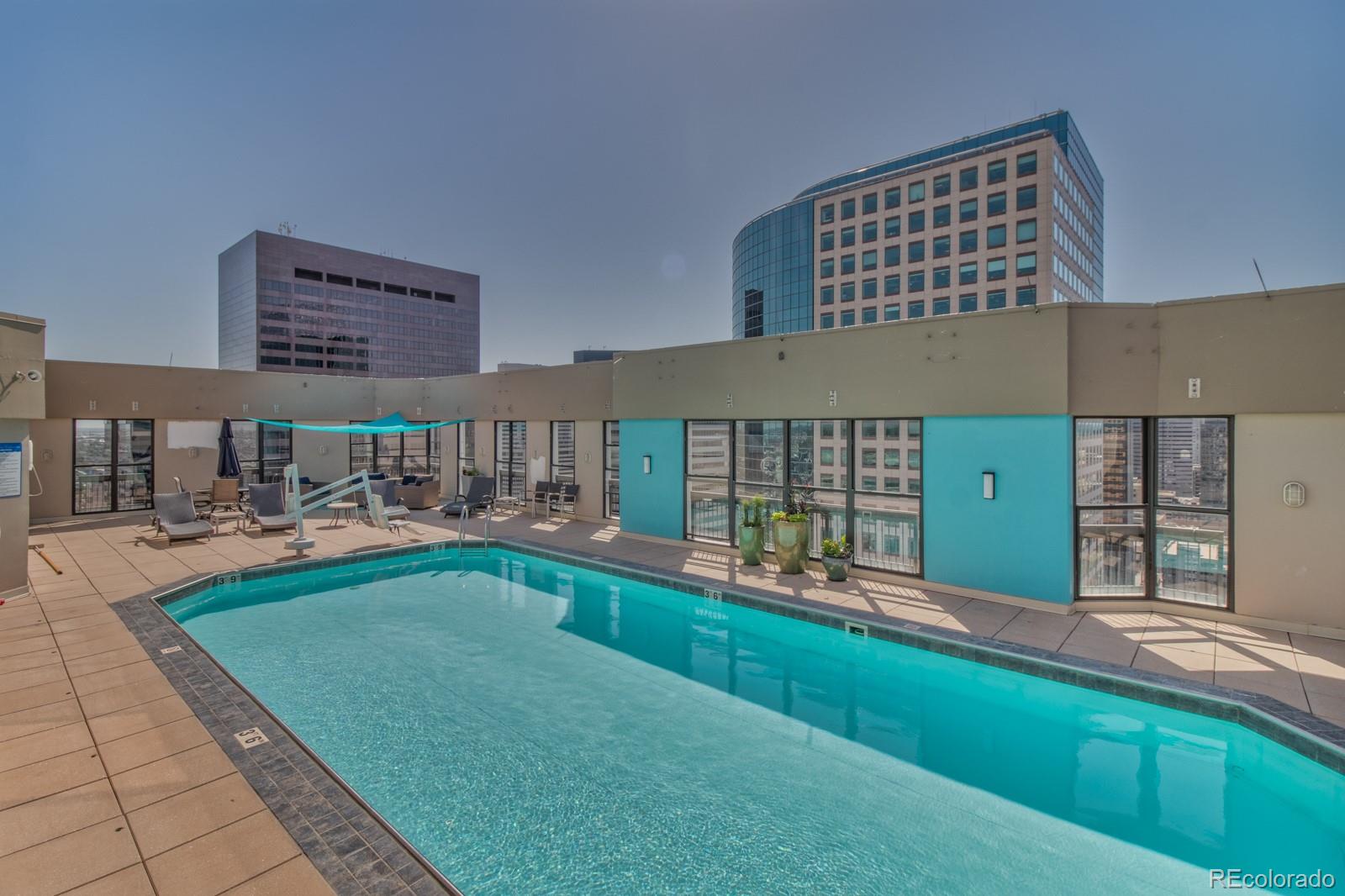 1625 Larimer Street, Unit 801 Denver, CO 80202 - Photo 26 of 33 a living room with furniture