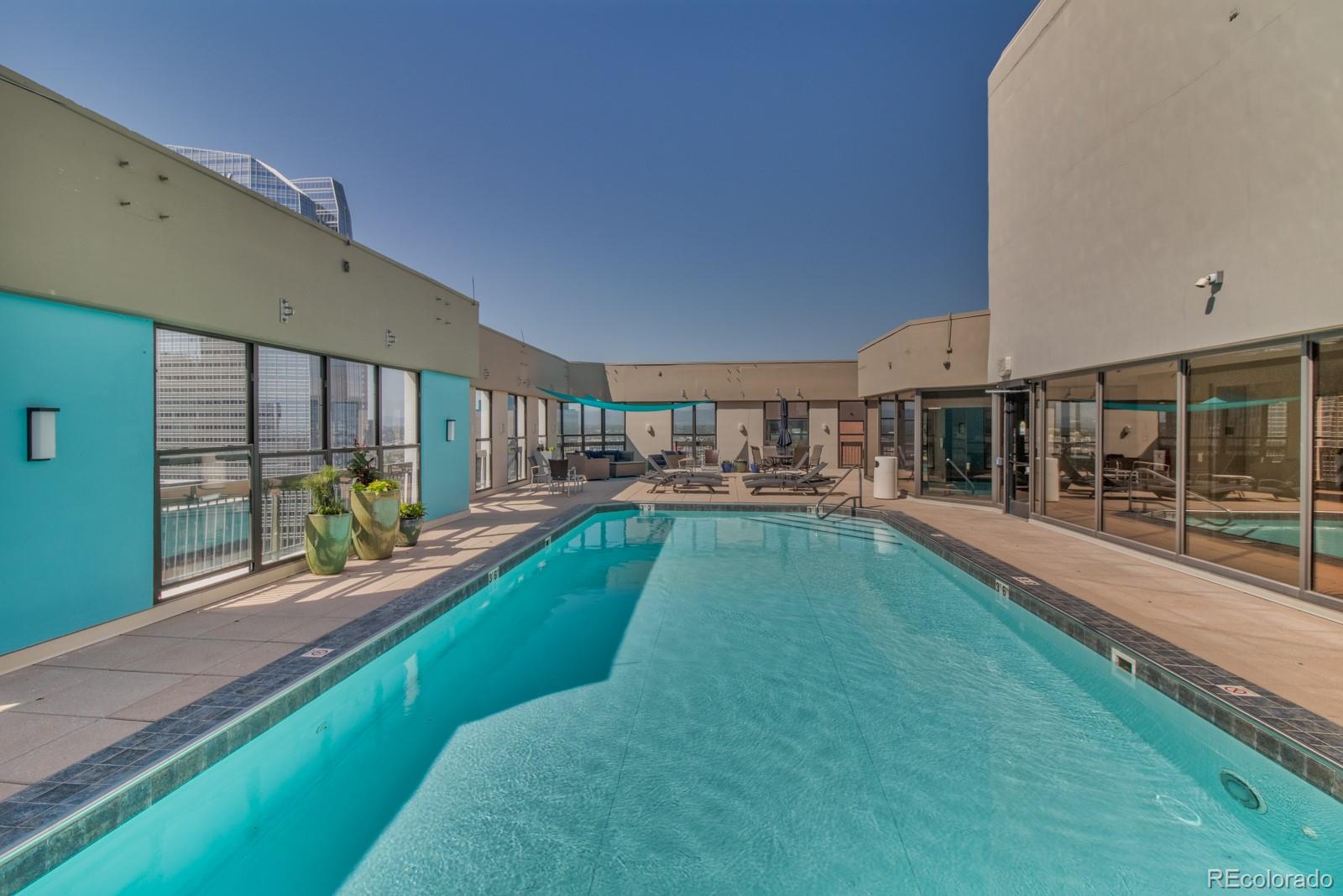 1625 Larimer Street, Unit 801 Denver, CO 80202 - Photo 28 of 33 a view of a house with a swimming pool