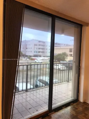 a view of a glass door with a glass door