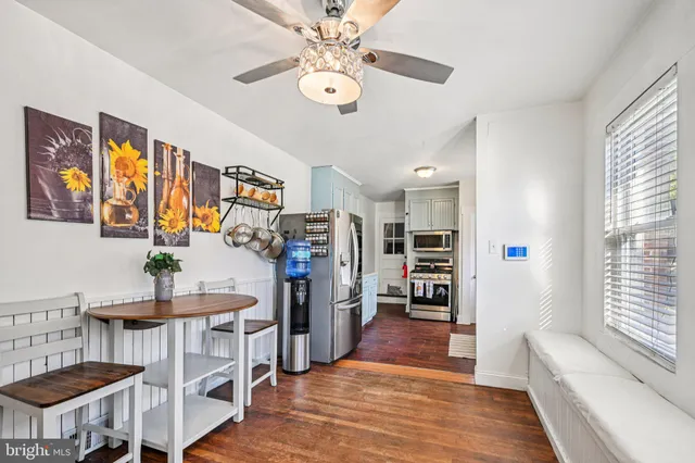 a view of a livingroom with furniture and window
