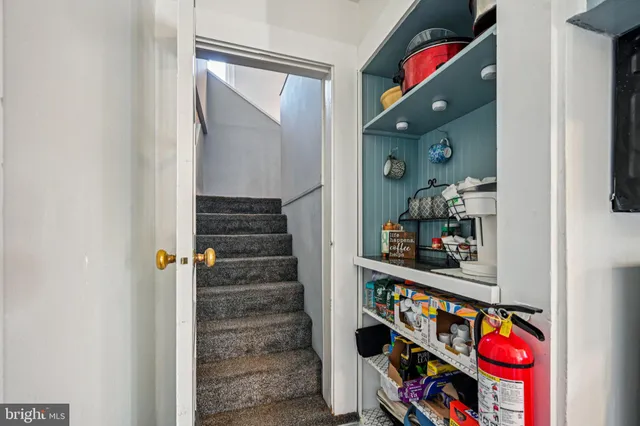 a room with lots of books and baby
