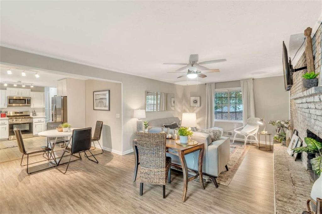 1504 Dupree Road Woodstock, GA 30189 - Photo 3 of 23 a view of a dining room with furniture window and wooden floor
