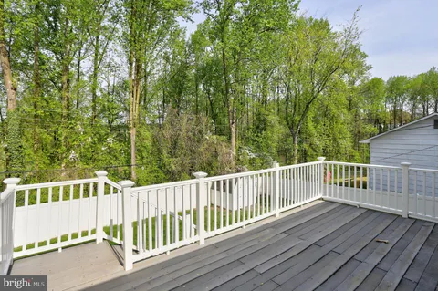 a view of a wooden roof deck