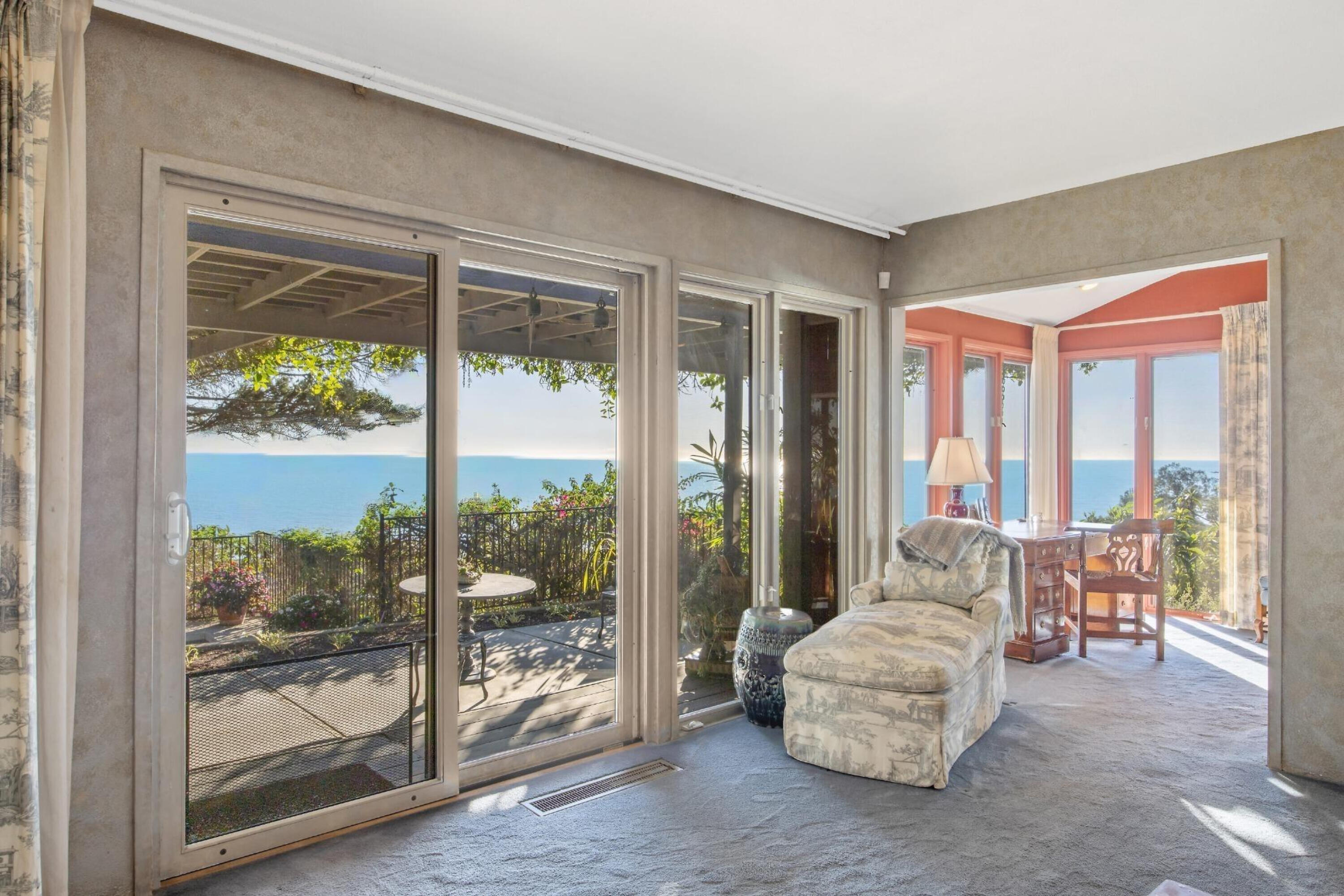 737 Sea Ranch Drive Santa Barbara, CA 93109 - Photo 25 of 40 Primary Suite Glass Doors to View Patio