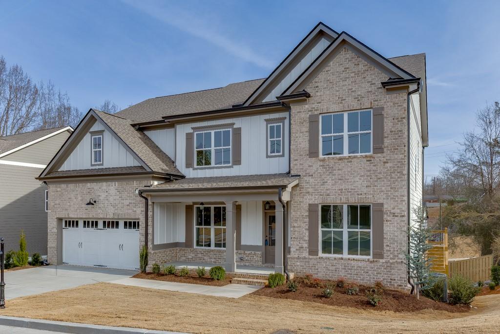 173 Swimming Pool Road Buford, GA 30518 - Photo 3 of 68 a front view of a house with garden
