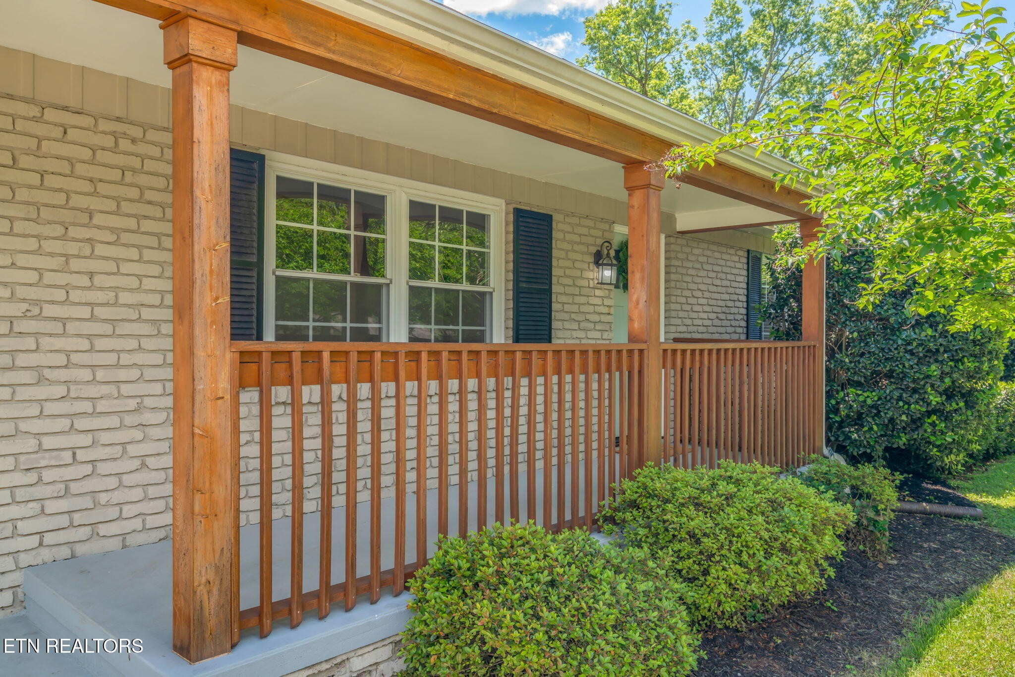 824 Noragate Road Knoxville, TN 37919 - Photo 4 of 29 a view of a house with a small yard and plants