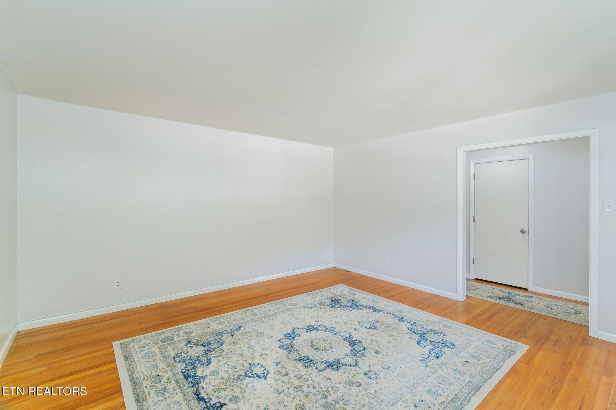 824 Noragate Road Knoxville, TN 37919 - Photo 6 of 29 a view of a room with a wooden floor and sink