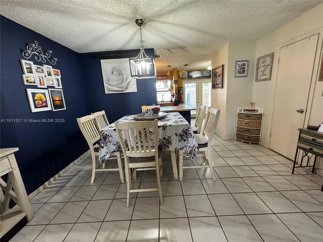 a dining room well furnished