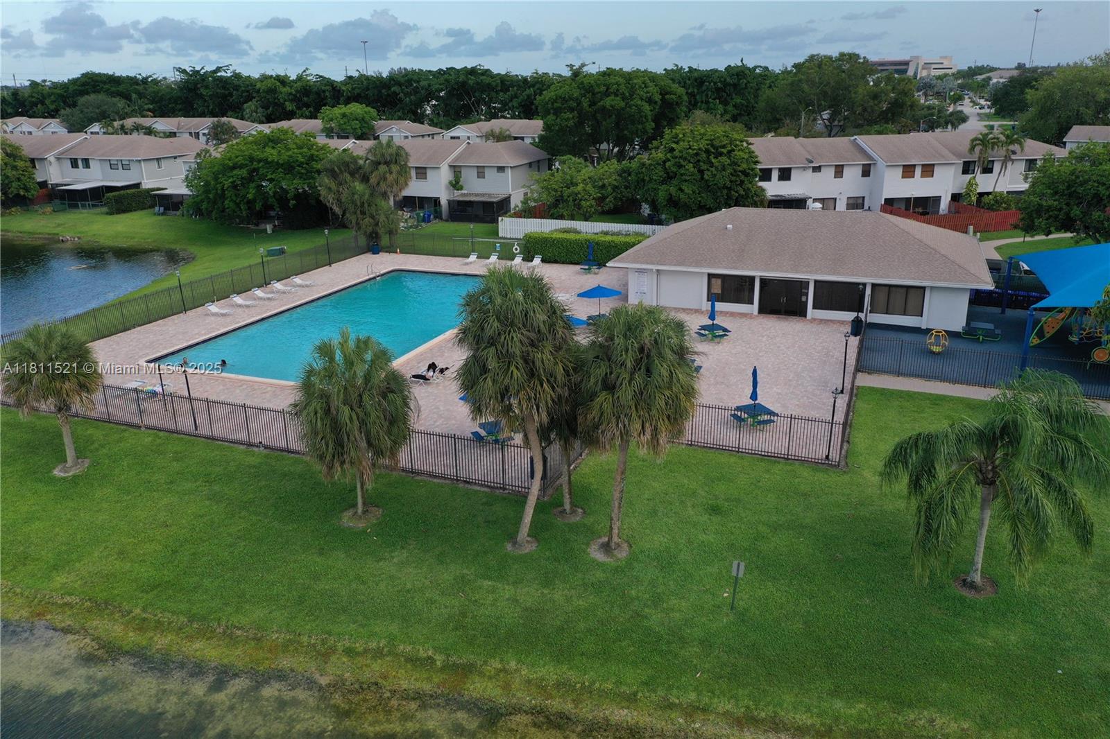 10428 Northwest 3rd Street Pembroke Pines, FL 33026 - Photo 27 of 30 an aerial view of a house with garden space and a patio