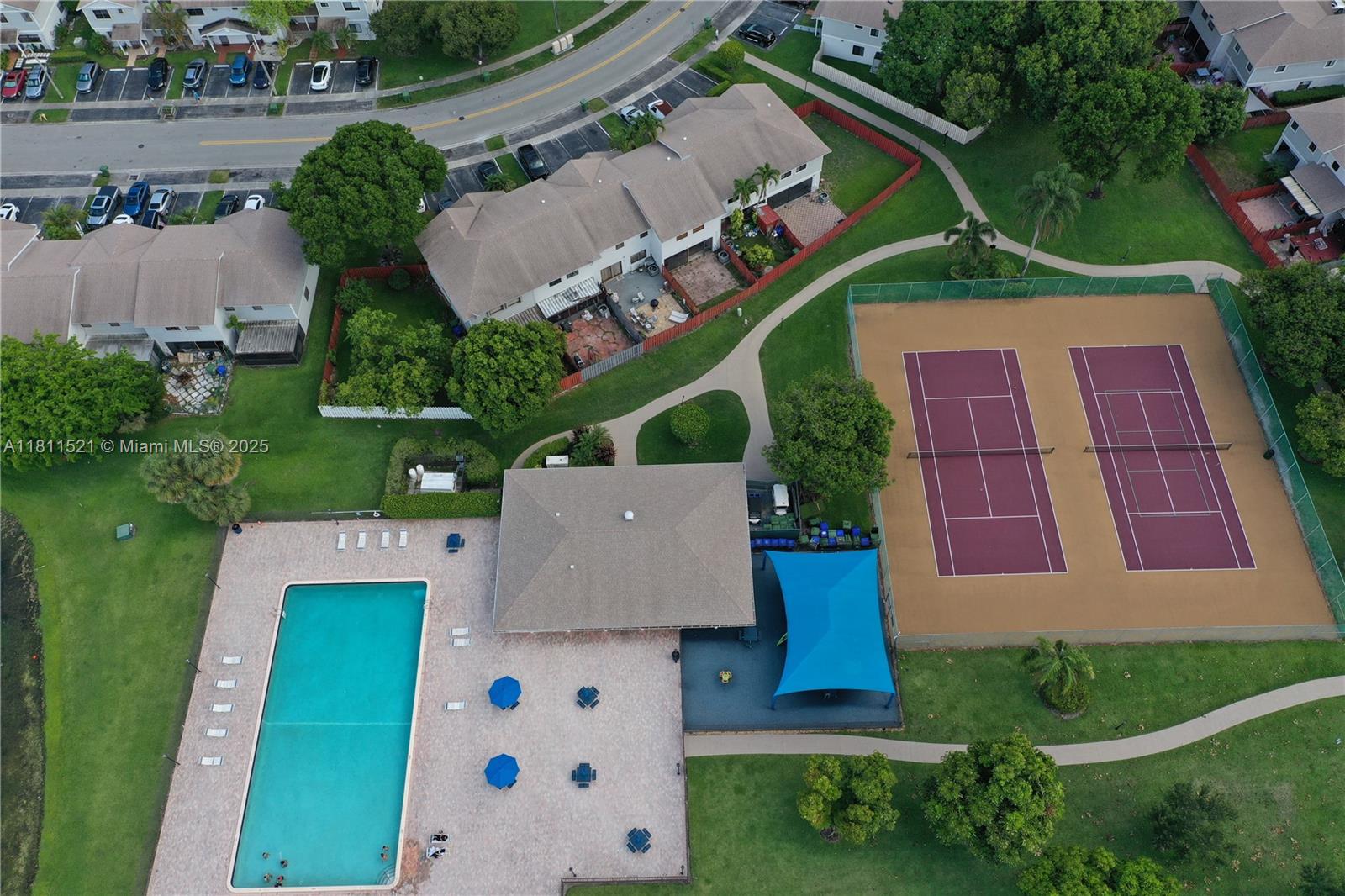 10428 Northwest 3rd Street Pembroke Pines, FL 33026 - Photo 28 of 30 an aerial view of house with yard swimming pool and outdoor seating