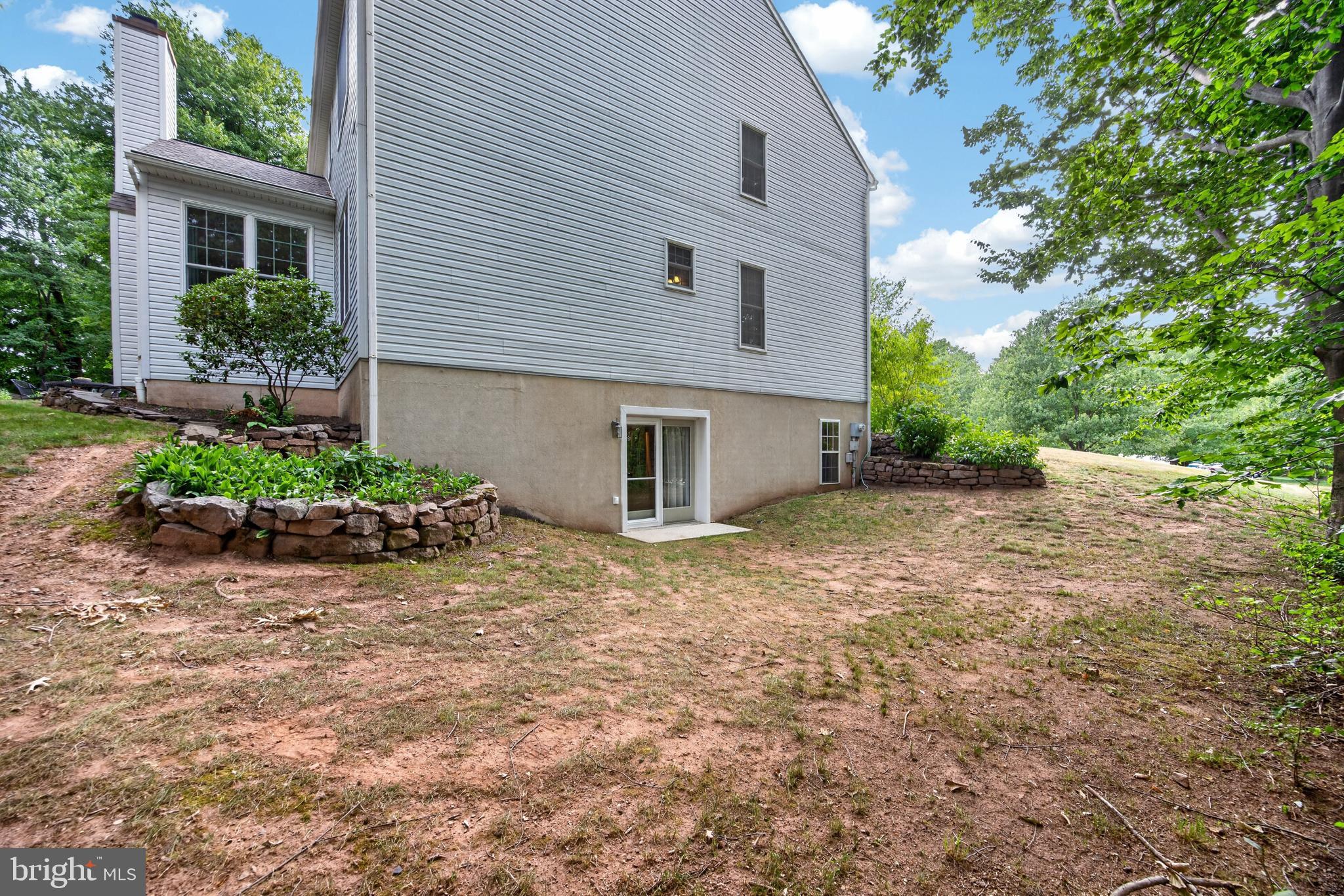 108 Robert Joseph Road Pottstown, PA 19465 - Photo 46 of 71 Side view, entrance goes into the Recreation room