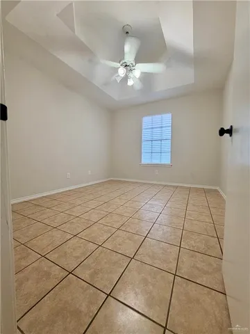 a view of an empty room and window