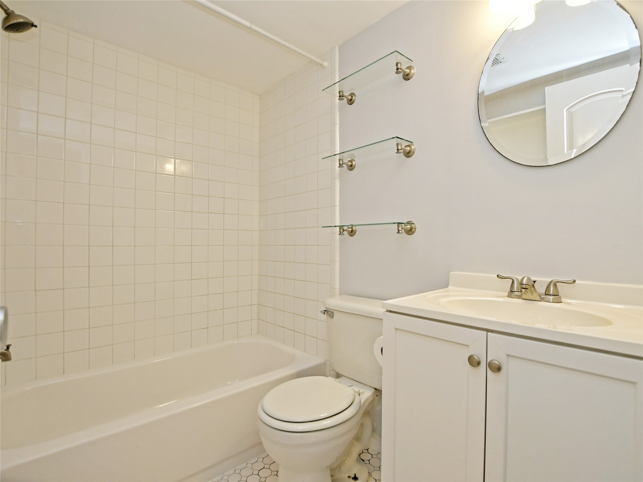 2500 Burleson Road, Unit 507 Austin, TX 78741 - Photo 12 of 14 a bathroom with a sink a toilet and shower