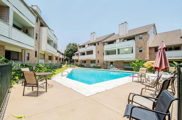 a building outdoor space with patio furniture