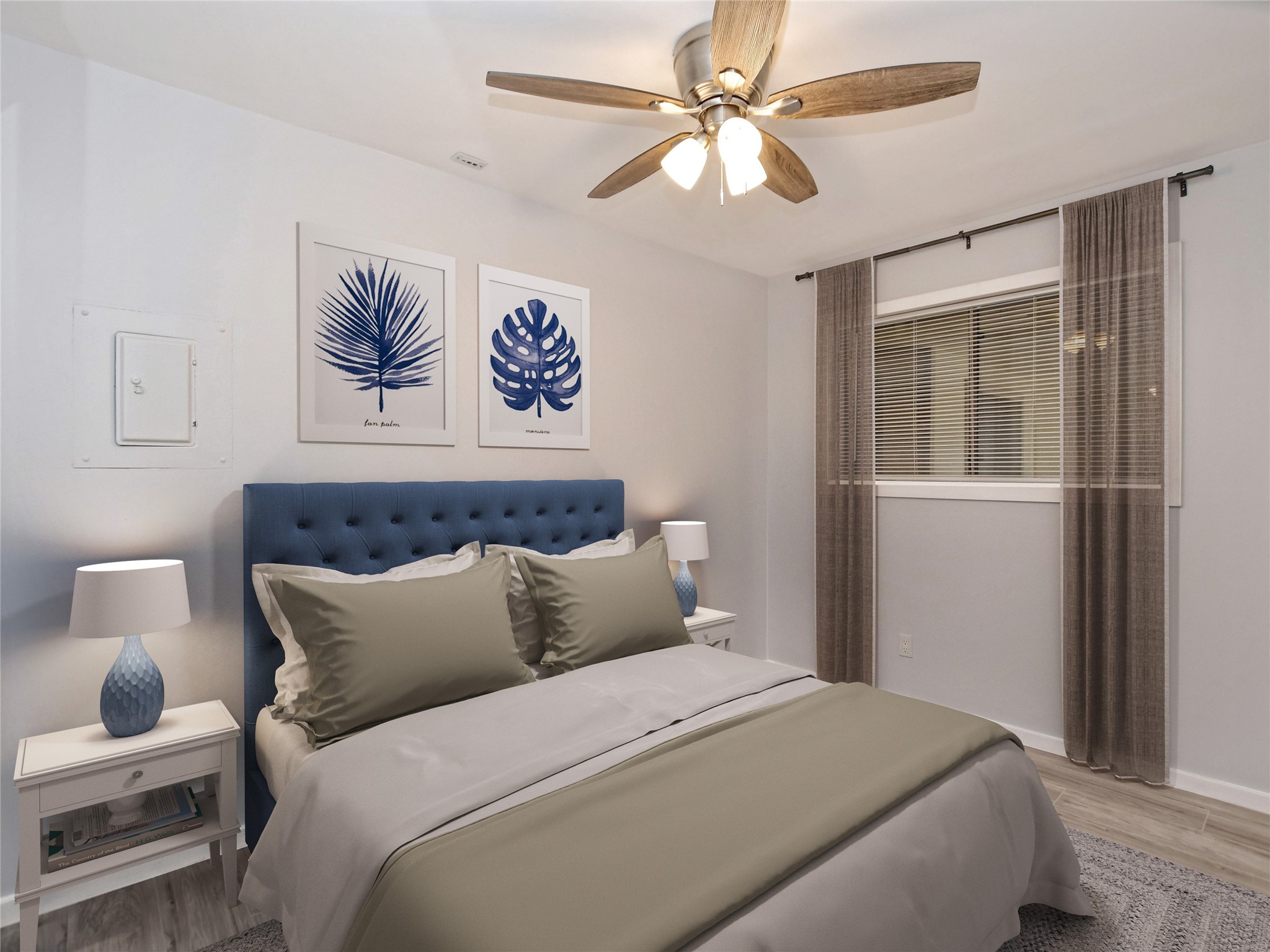 2500 Burleson Road, Unit 507 Austin, TX 78741 - Photo 9 of 14 a bedroom with a large bed and a chandelier