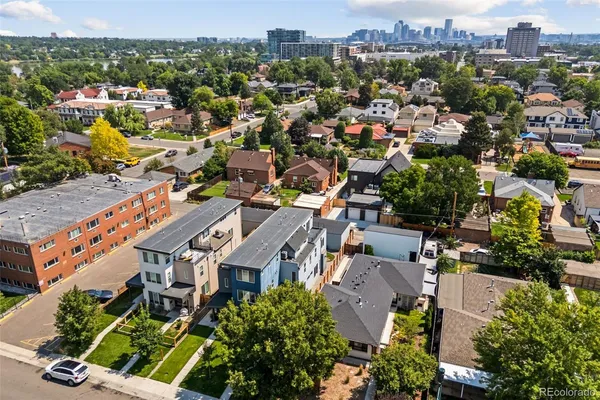 an aerial view of residential building with lake view