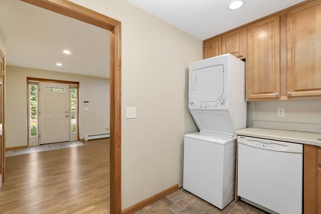 75 Chipaway Road Freetown, MA 02717 - Photo 27 of 34 a view of hallway with wooden floor and cabinets