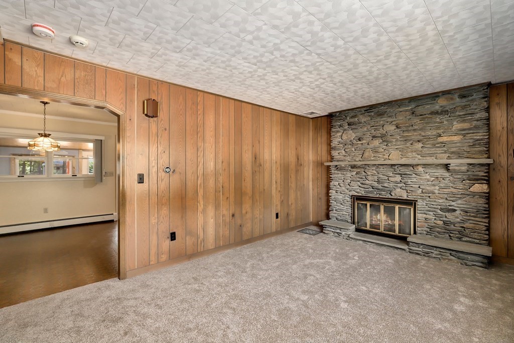 75 Chipaway Road Freetown, MA 02717 - Photo 6 of 34 a view of an empty room with a fireplace