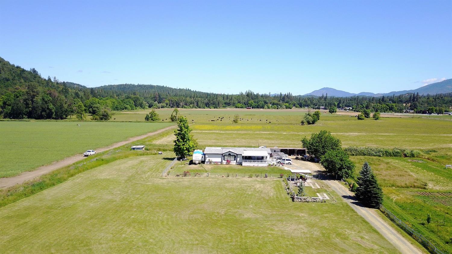 5390 Lower River Road Grants Pass, OR 97526 - Photo 21 of 35 a view of an outdoor space and lake view