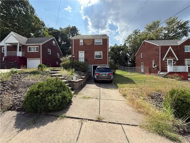 a view of house with outdoor space area