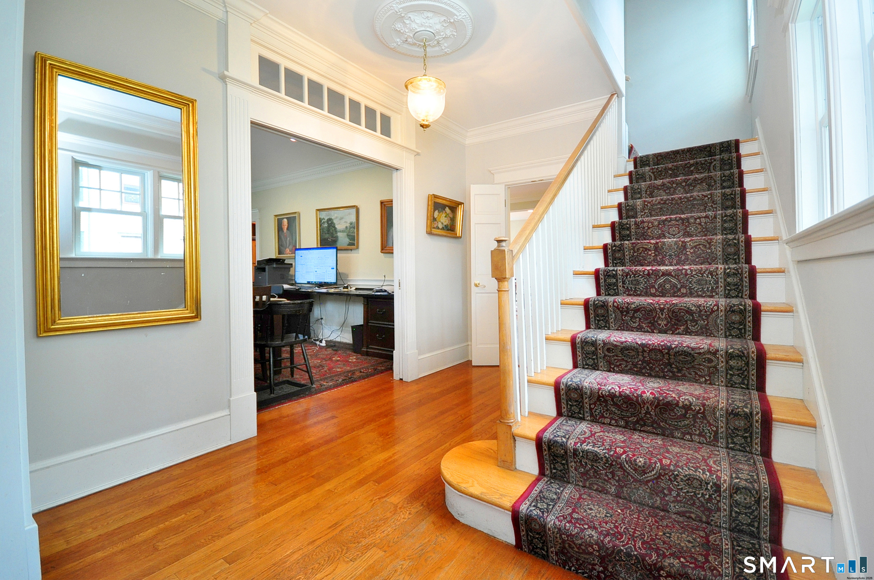 371 North Main Street Suffield, CT 06078 - Photo 17 of 39 a view of entryway and hall with wooden floor