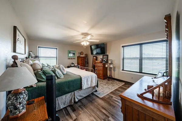 a bed room with a bed and a couch