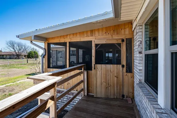 a view of a house with a outdoor seating