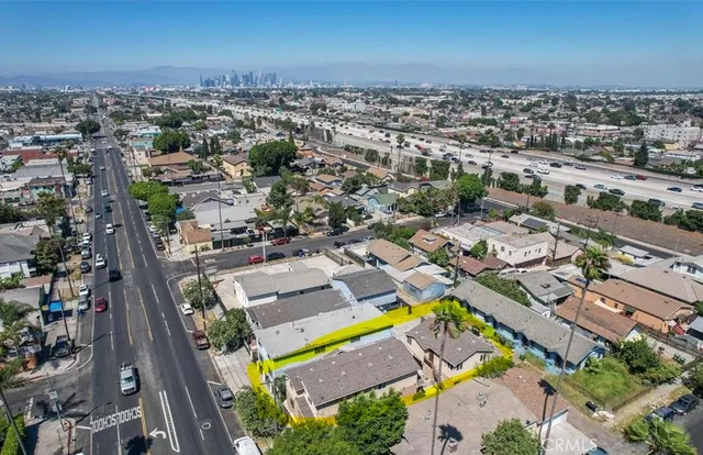 an aerial view of a city with lots of residential buildings
