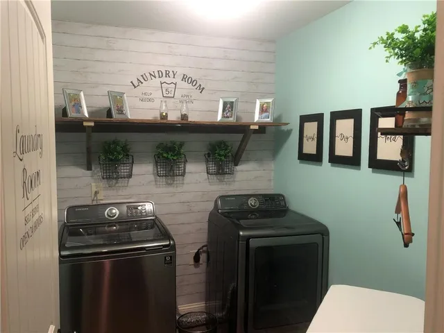 a view of a yard with a tree