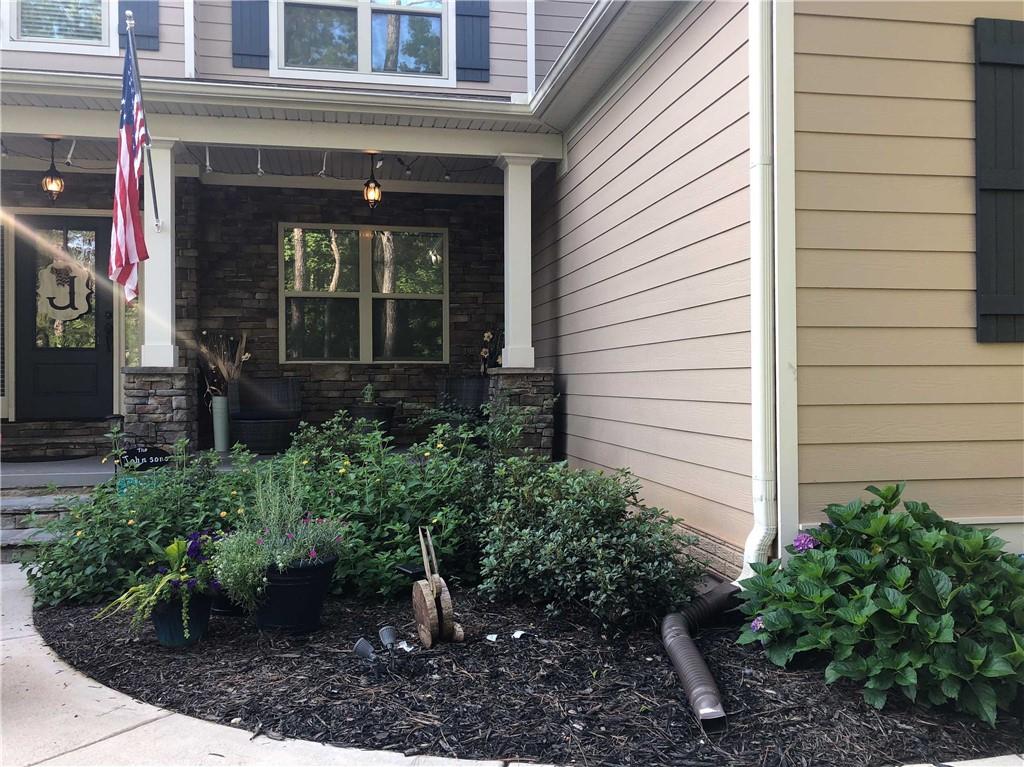 37 Farmstead Way Senoia, GA 30276 - Photo 17 of 96 a view of a house door with a potted plant front of house