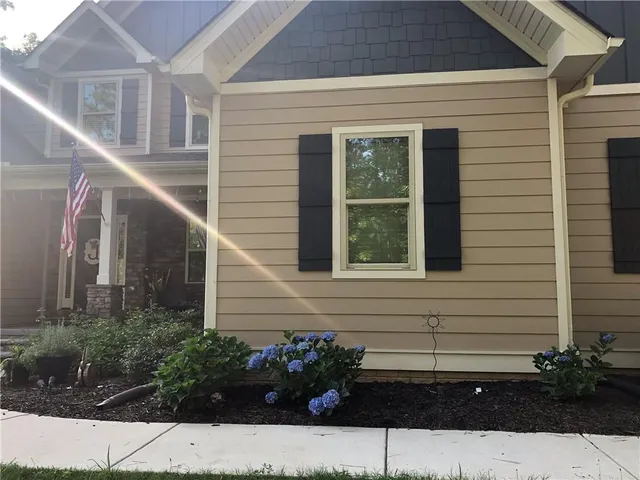 a view of a yard with swimming pool